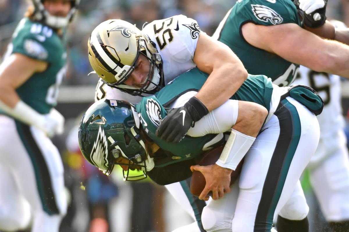 Philadelphia Eagles quarterback Gardner Minshew (10) is sacked by New Orleans Saints linebacker Kaden Elliss (55). Mandatory Credit: Eric Hartline-USA TODAY 